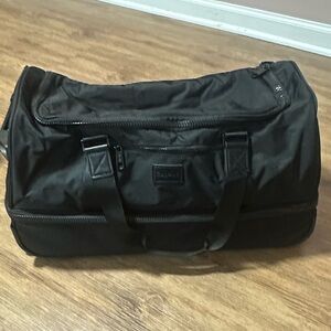 Calpak Rolling Duffel Bag